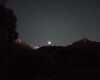 Il chiarore della luna illumina il Tredenus e la vetta del Pizzo Badile  Camuno. Visti da Cimbergo.